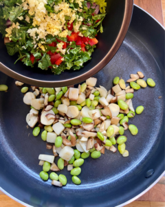 Asian-Inspired Vegan Ceviche, made with heart of palm, shiitake mushrooms, edamame, red peppers, red onion, cilantro, chives, hemp hearts, and a lime Asian-inspired marinade.