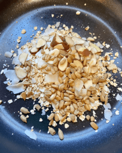 oats, nuts, and coconut for vegan granola