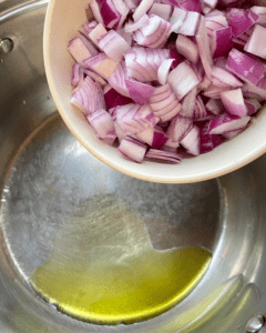 olive oil and onions for vegan sausage and couscous soup