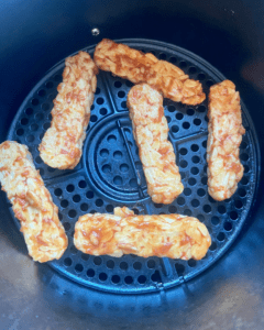 Tempeh strips marinated in a smoky, tangy sauce and air-fried until crisp. An excellent, protein packed, plant-based substitute for meat. 