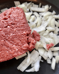 Impossible ground beef for Vegan Bulgogi Egg Rolls, loaded with plant-based Bulgogi "beef", rice, kimchi, and cabbage. Air-fried to perfection!