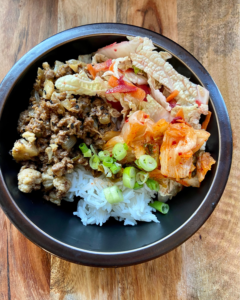 vegan Bulgogi rice bowl make with asian cabbage slaw and kimchi