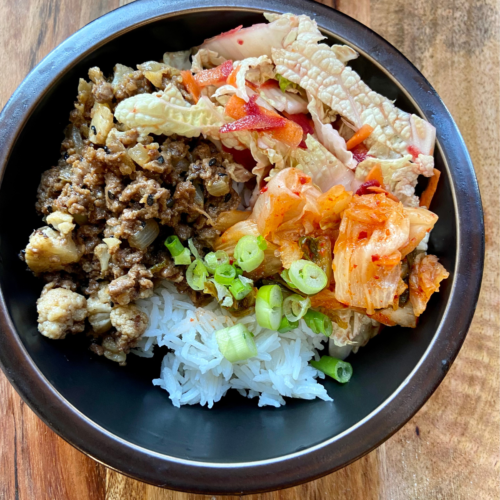 vegan Bulgogi rice bowl make with asian cabbage slaw and kimchi