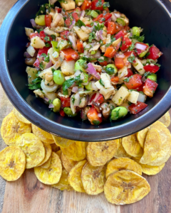 Asian-Inspired Vegan Ceviche, made with heart of palm, shiitake mushrooms, edamame, red peppers, red onion, cilantro, chives, hemp hearts, and a lime Asian-inspired marinade.