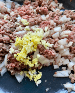 vegan impossible ground beef for Vegan Bulgogi Egg Rolls, loaded with plant-based Bulgogi "beef", rice, kimchi, and cabbage. Air-fried to perfection!