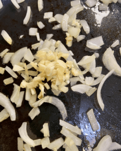 add garlic to sautéed onions