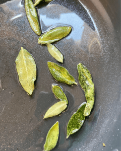 sage in oil in pan