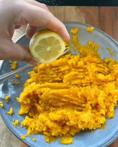 adding ingredients to butternut squash