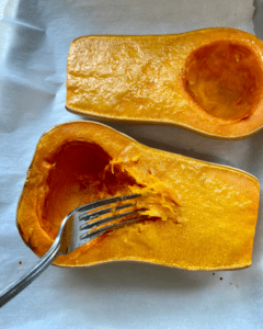 removing butternut squash with fork