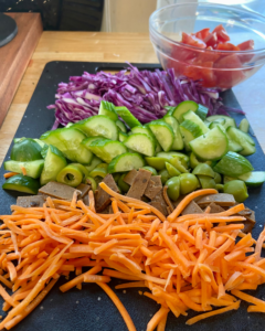 carrots and other ingredients for Italian hoagie sandwich salad vegan recipe