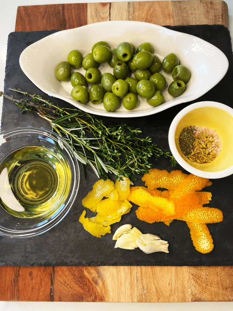 warm marinated olives for charcuterie board ingredients