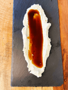 Vegan wasabi spread and miso caramel being plated