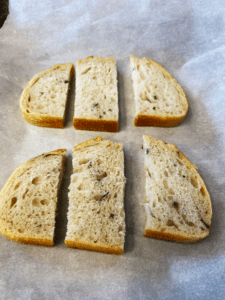 rosemary sourdough bread on baking sheet