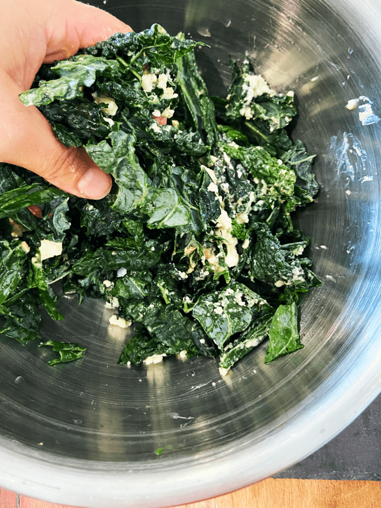 massaging kale and dressing 