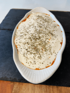 miyokos liquid mozzarella dip topped with Italian seasoning