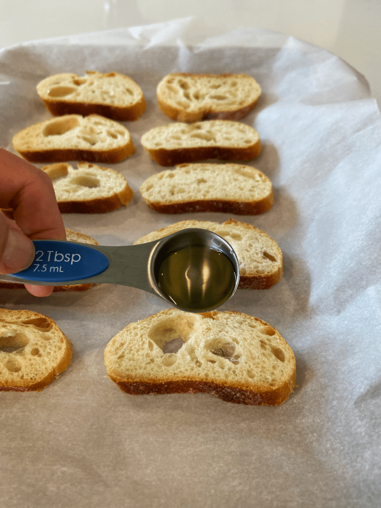 French baguette and olive oil for bread for a charcuterie board