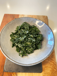 plating kale for vegan steak and kale salad