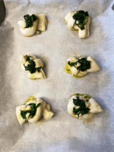 pillsbury garlic knots topped with garlic herb butter