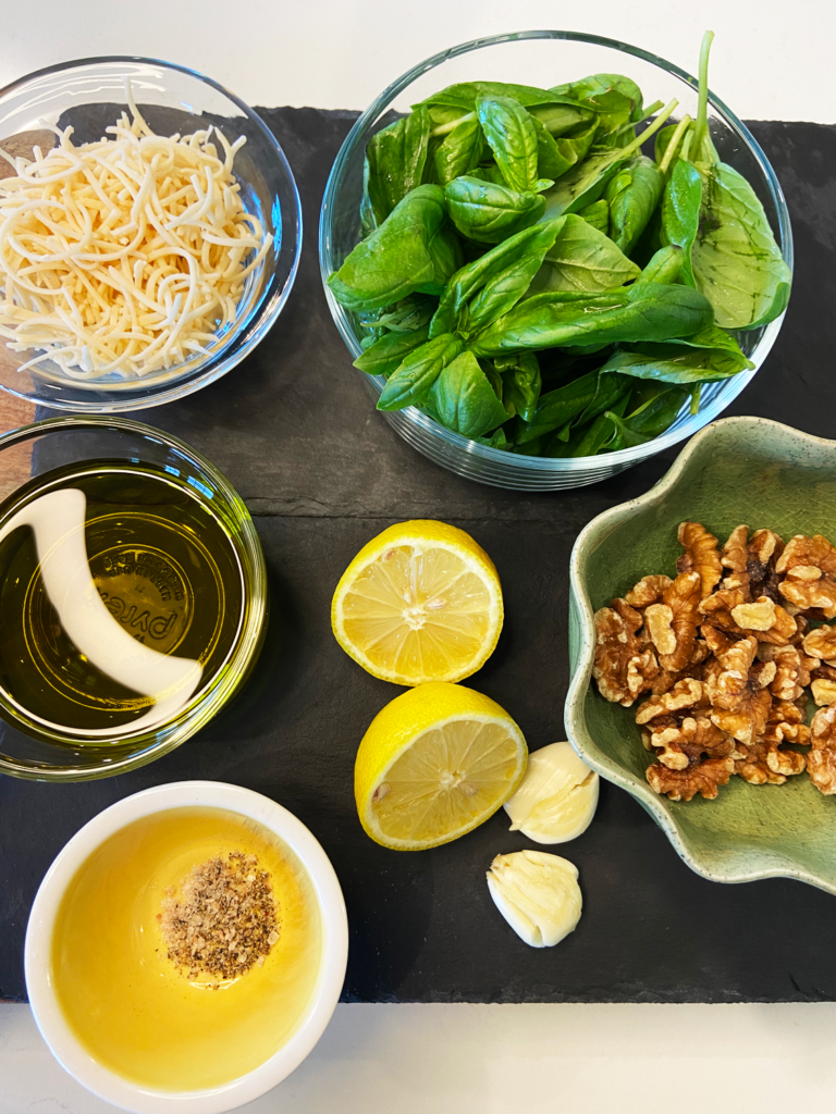 Ingredients for vegan pesto recipe with walnuts