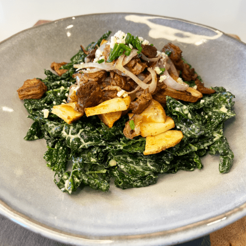 vegan steak and kale salad with blue cheese