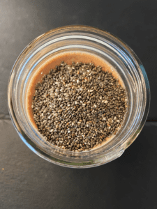 chia seeds added to chia seed pudding mix