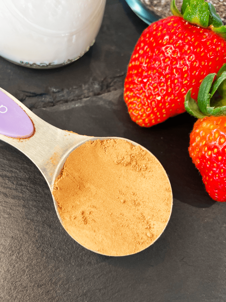 cocoa and strawberries for chia seed pudding recipe made with oat milk