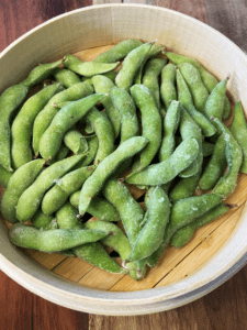 frozen edamame in a steam basket