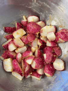 radishes tossed in garlic miso rub