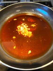 ingredients for garlic soy sauce in pan