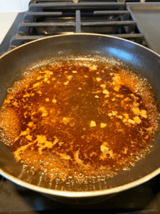 ingredients for garlic soy sauce in pan