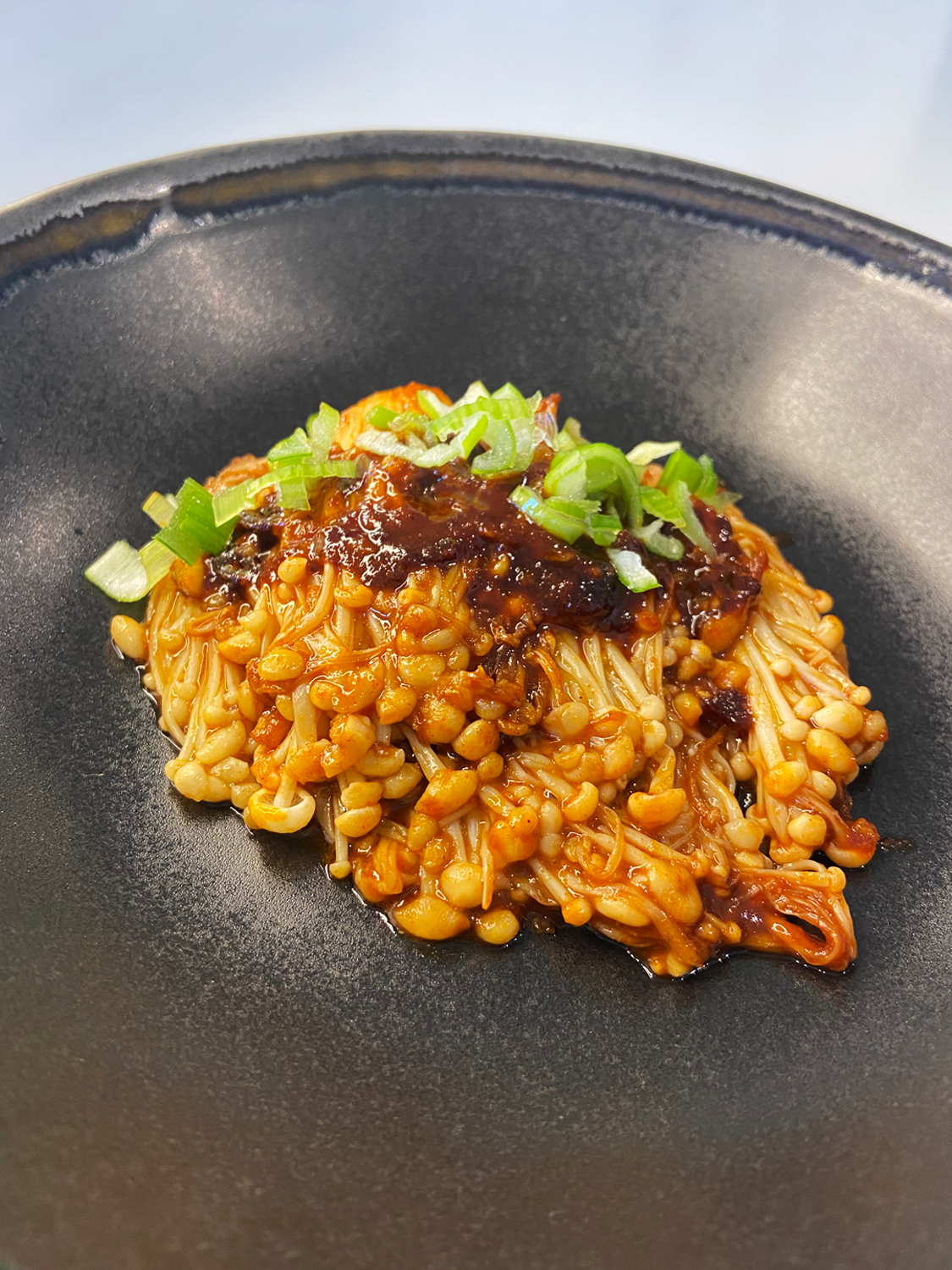 Gochujang enoki mushrooms in spicy garlic sauce