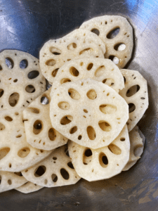 lotus root and olive oil in a bowl