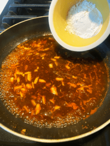 adding cornstarch to sauce for Indian lotus root recipe