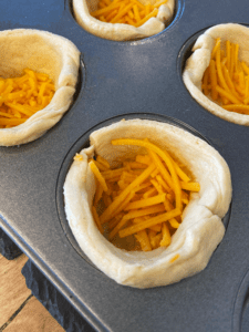 adding vegan cheddar to Just Egg Quiche cups