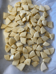 seasoned daikon radishes on a baking sheet