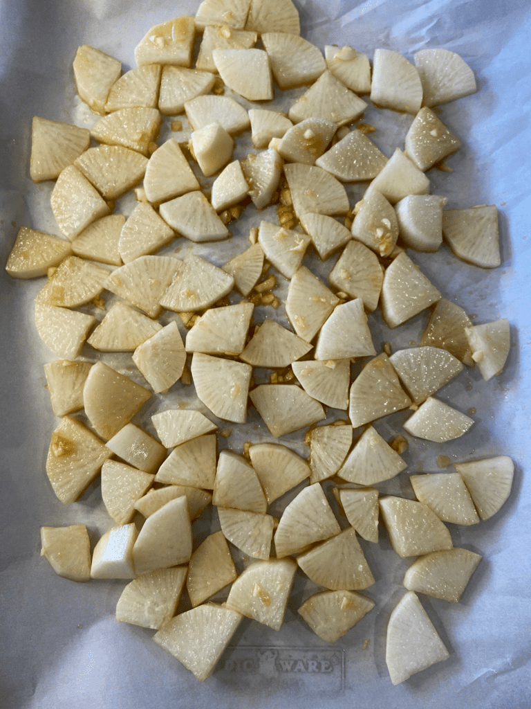 roasted daikon radishes on a baking tray