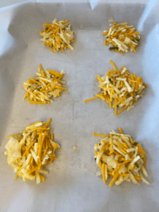 placing vegan cheese potato has on a baking tray