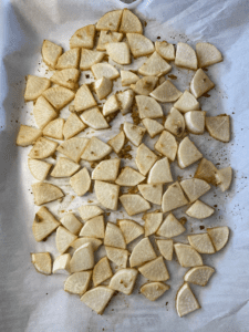 roasted daikon radishes on a baking sheet