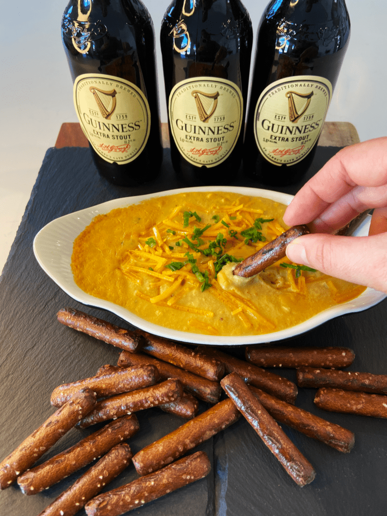 Guinness vegan cheese sauce served with pretzels