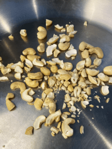 cashews in a skillet for cooked canned bamboo shoots