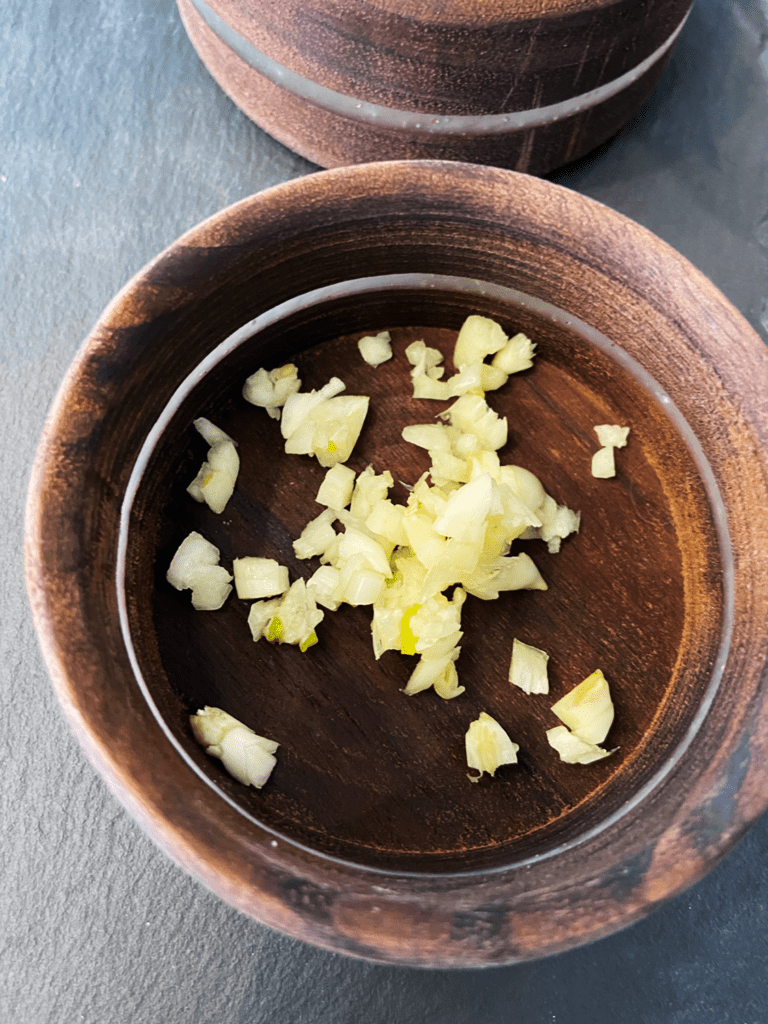 garlic for white bean buffalo dip with vegan blue cheese crumbles