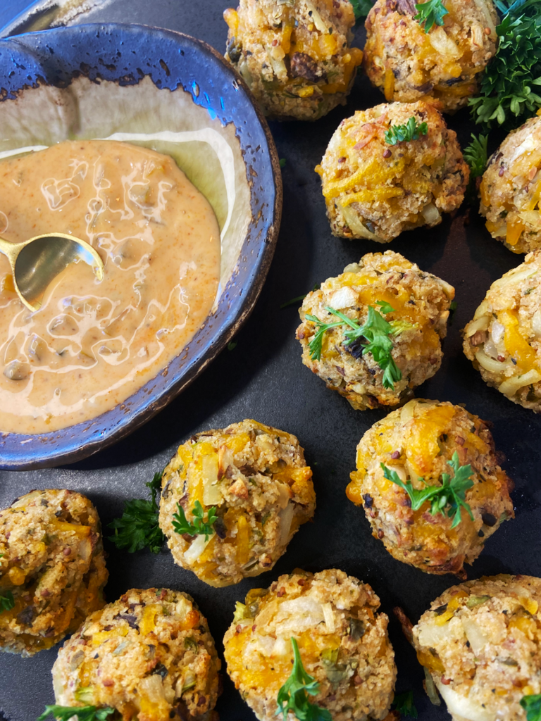 air fryer cheesy vegan crab bites with vegan Old Bay sriracha aioli