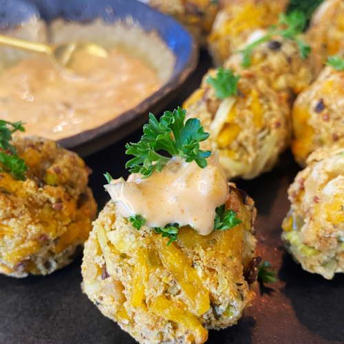 air fryer cheesy vegan crab bites with vegan old bay sriracha aioli