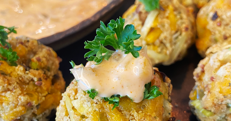 air fryer cheesy vegan crab bites and Old Bay Sriracha Aioli