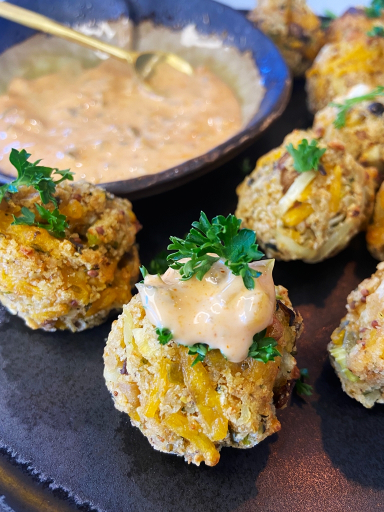 air fryer cheesy vegan crab bites with vegan Old Bay sriracha aioli