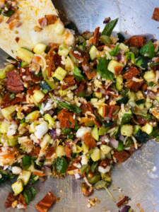 Ingredients for Italian filling mixed in bowl