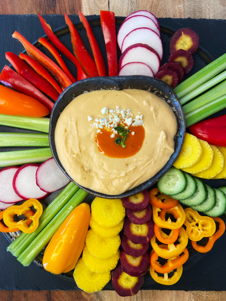 WHITE BEAN BUFFALO DIP WITH VEGAN BLUE CHEESE CRUMBLES