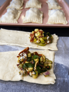 filling pizza dough with filling