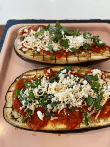 vegan garlic butter stuffed eggplant parmesan before cooking