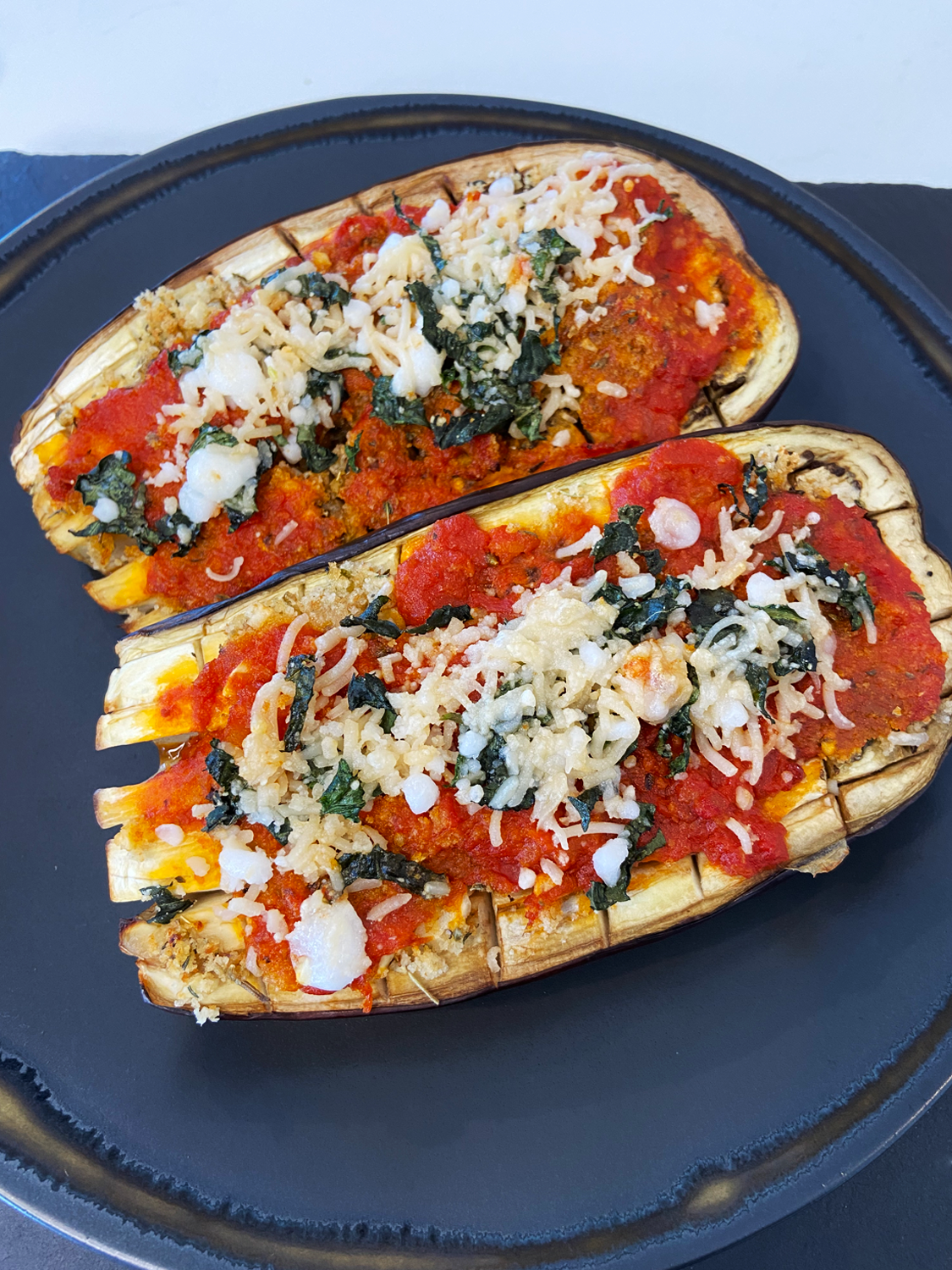 Air fryer : vegan garlic butter stuffed eggplant parmesan